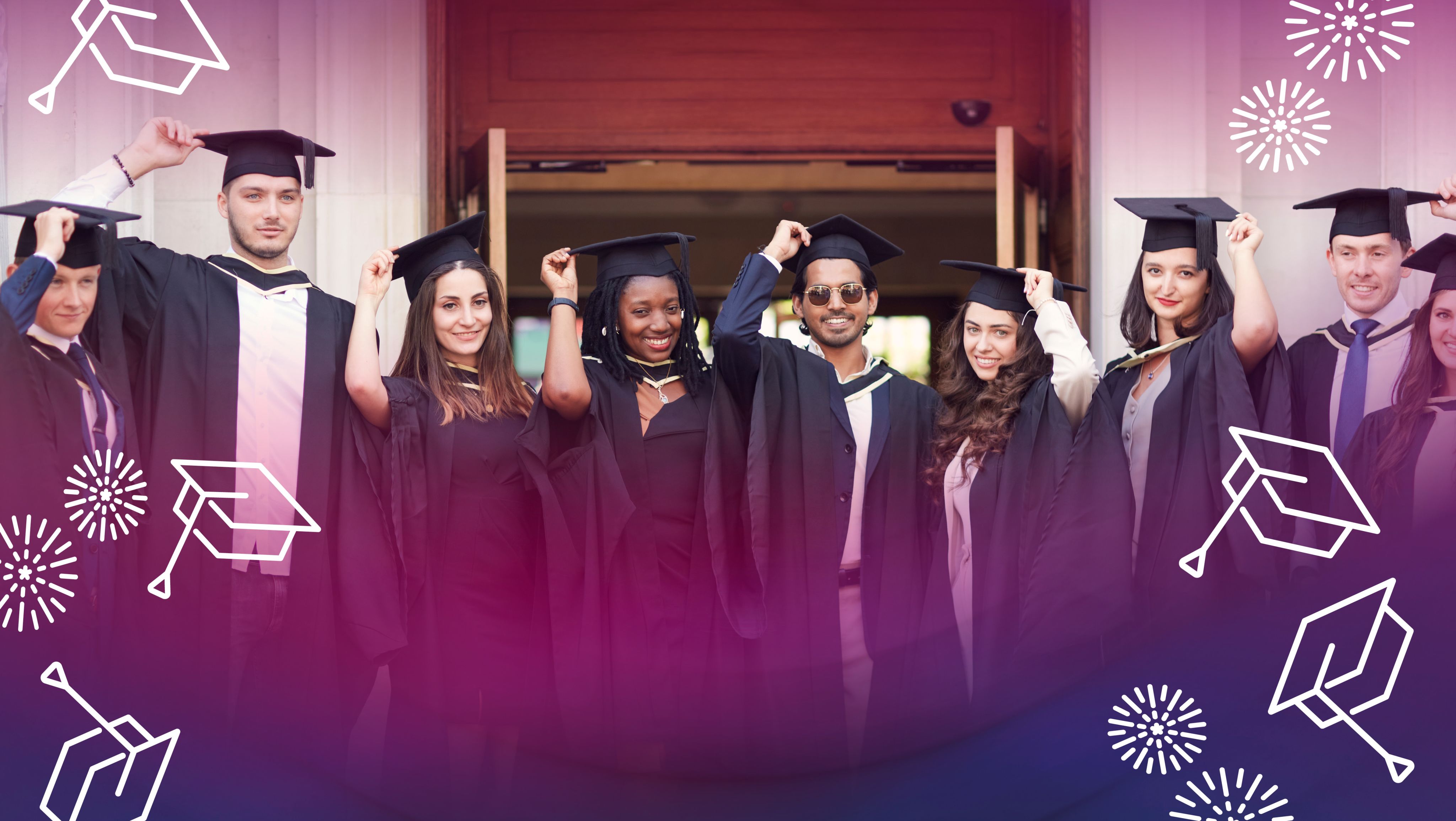 Group of graduates throwing caps in the air